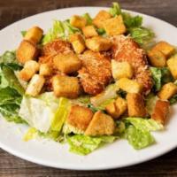 Individual Buffalo Chicken Salad · A side portion of crispy romaine lettuce topped with spicy buffalo chicken, shaved parmesan ...