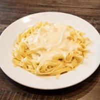 Fettuccine · Fresh cooked Fettuccine pasta, served with our homemade Marinara sauce. Homemade Alfredo sau...
