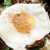Bi-Bim-Bab · Gluten-free. Assortment of lightly sauteed vegetables, beef, fried egg served with steamed r...