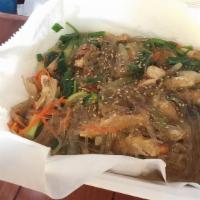 Japchae Noodles · Stir fried sweet potato vermicelli with vegetables and beef in a rich soy based sauce.