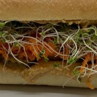 Pb & Veggie Sandwich · Fresh ground peanut butter, carrots, sprouts and sweet and spicy pickles on a local artisan ...