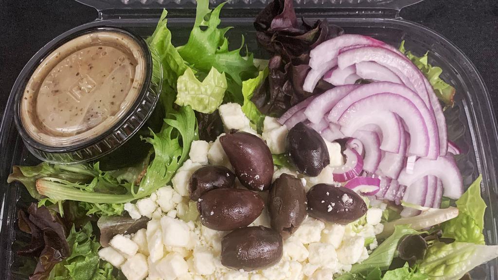 The Greek · Feta, Kalamata olives, red onion, tomato, cucumber and mixed greens with a red wine vinaigrette.