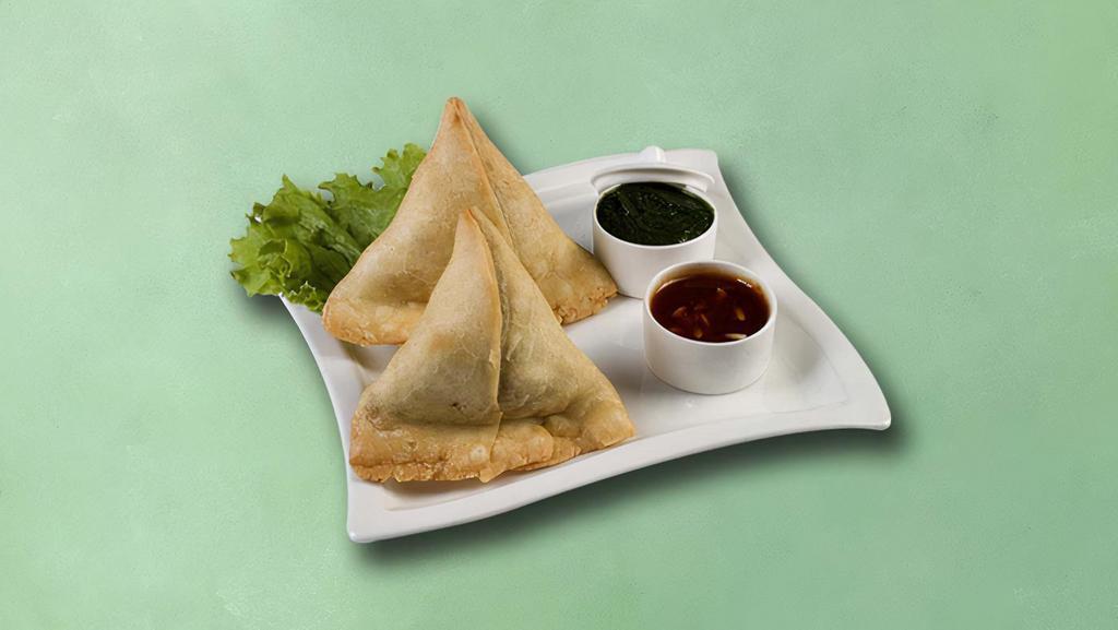 Village Veggie Turnovers (Vegan) · Crispy fried pastry with a savory filling