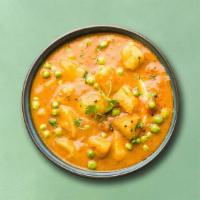 Potato & Green Peas (Vegan) · Peas and potatoes, simmered to perfection in an onion, tomato and Indian curry