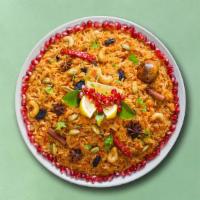 Classic Veggie Biryani (Vegan) · Fragrant basmati rice and veggies cooked in slow flame with Indian spices