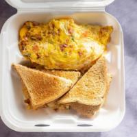 Western Omelette · Ham, onions, tomatoes, green peppers and American cheese.