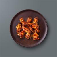 Backyard Bbq Wings · Classic barbecue style wings smothered in our house bbq sauce.
