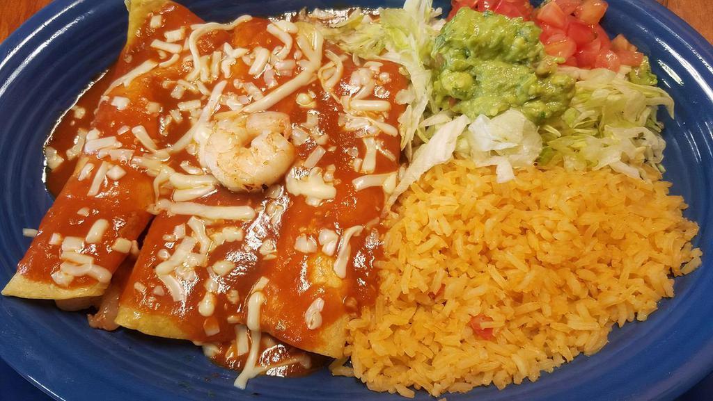 Enchiladas Supremas · Can’t decide what you want? This delicious ensemble gives you one of each of the enchiladas we offer. beef, chicken, cheese, and bean, all topped with lettuce tomatoes and sour cream.