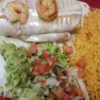 Shrimp Chimichanga · Grilled shrimp and cheese wrapped in a flour tortilla, deep-fried, and covered with cheese d...