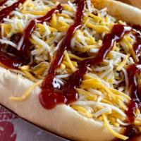 Dirty Dog · 1/5 LB All Beef Hot Dog Topped with Pulled Pork, Shredded Cheese & BBQ Sauce