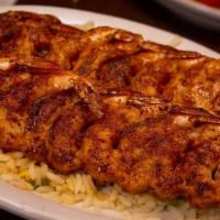 Grilled Mesquite Shrimp Platter  · 20 pieces of mesquite-grilled shrimp served with a side of rice.