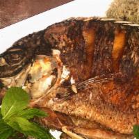 Whole Fish · Whole tilapia fish seasoned with exotic spices and fried.