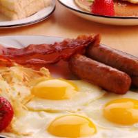 Meats Lover'S Breakfast · Two eggs with two slices of bacon. Two sausage links and canadian bacon. Served with hash br...