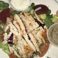 Tuscan Chicken Salad · Spinach and baby greens with grilled chicken, red peppers, artichoke hearts, goat cheese and...