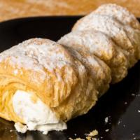 Cream Horn · Flaky pastry dough, handmade at our shop, filled with cream filling and sprinkled with powde...