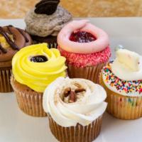 Assorted Gourmet Cupcakes (1/2 Dz) · 1/2 dozen gourmet flavored cupcakes. Assortment varies based on availability at the moment.