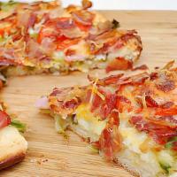 Blt Pizza · Mozzarella cheese, bacon, mayo, lettuce, tomatoes.