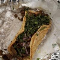 Alambre Taco · Bacon, steak, cheese and green pepper with onions and cilantro.