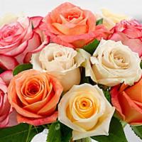 Sundance Rose Bouquet  · A soft assortment of roses to create a sweet and stunning arrangement. Cream white orange an...