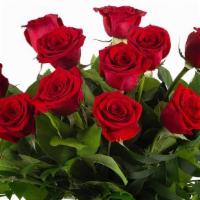 12 Red Roses With Glass Vase  · Picked fresh from the farm to offer your special recipient a gift straight from the heart, o...
