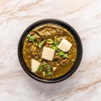 Palak Paneer · Spinach with cheese in cream sauce.