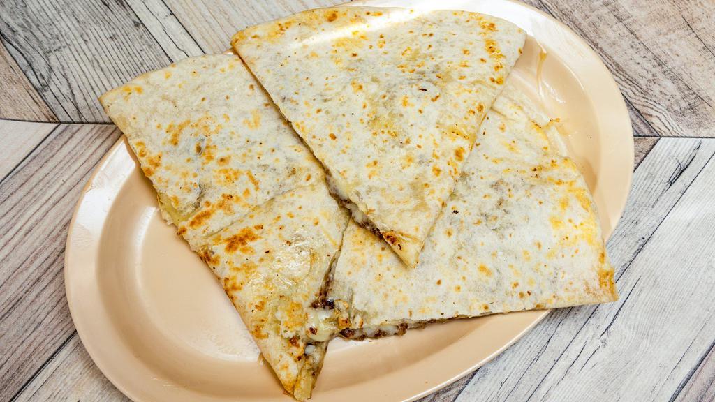Quesadilla With Meat · Choice of meat - chicken, chorizo, ground beef in a flour tortilla and cheese. Comes with a small side of pico de gallo.