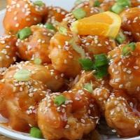 C Sesame Chicken · Served with egg roll and fried rice.