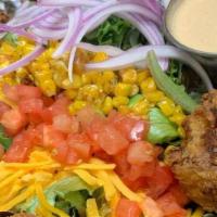 Southwest Ranch Salad · Southern fried buttermilk thighs with tomatoes, red onion, roasted sweet corn, cheddar chees...