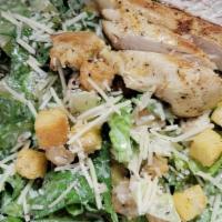 Chicken Caesar Salad · Romaine lettuce, shredded asiago and croutons tossed in traditional Caesar dressing, finishe...