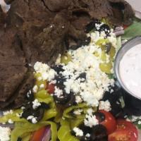 Grecian Salad · mixed greens topped with gyro meat, feta cheese, banana peppers, kalamata olives, red onion,...