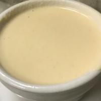 Haus-Made Beer Cheese Soup · White cheddar cheese and amber ale.