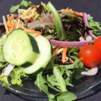 Side Salad · Mixed greens, tomato, cucumber, red onion, carrots, and choice of dressing.