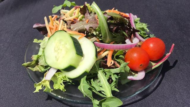 Side Salad · Mixed greens, tomato, cucumber, red onion, carrots, and choice of dressing.