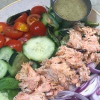 Smoked Salmon Salad · flaked smoked salmon atop mixed greens, tomatoes, cucumbers, and red onion served with lemon...