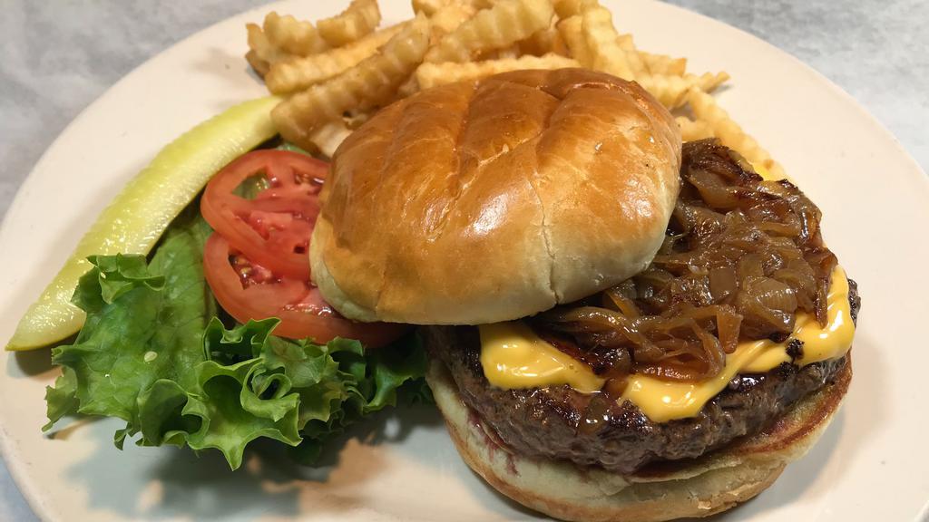 The Blue Ribbon Burger · haus patty topped with double american cheese and sauteed onion