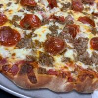 Meat Lovers Pizza · Our original crust, haus sauce, mozzarella, bacon, ham, pepperoni and sausage.