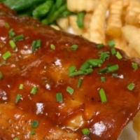 Bbq Pork Ribs · Bbq pork ribs tender pork ribs that are dry rubbed and slow simmered with our haus-made bbq ...