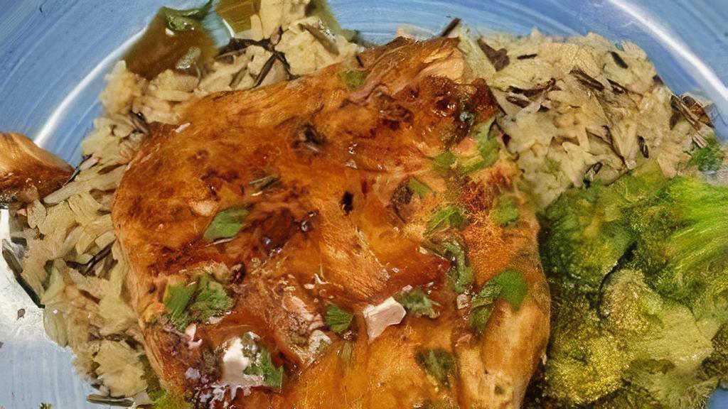 Seared Salmon · haus cut salmon, wild rice, sauteed broccoli and stinging honey garlic sauce.