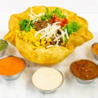 Taco Salad Shell · Large taco salad shell with choice of filling, lettuce, corn, salsa, cheese & sour cream.
