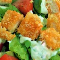 Buffalo Chicken Salad · Spicy. Crisp romaine lettuce, onions, tomatoes, feta cheese tossed with sesame seed oil topp...