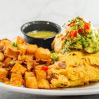 Mexicana Omelette · Avocado, chicken chorizo, onion, jalapeno, and cheddar jack cheese topped with sour cream an...