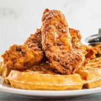 Chicken & Waffles · Belgian waffle topped with spicy, crispy southern fried boneless chicken breast with a touch...