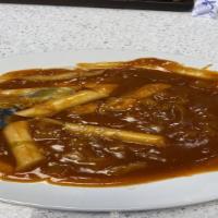 Tteokbokki · Spicy. Rice cake, fish cake and vegetables in spicy sauce.