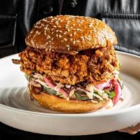 Nashville Hot Chicken Sandwich · slaw, pickles, z sauce, brioche bun