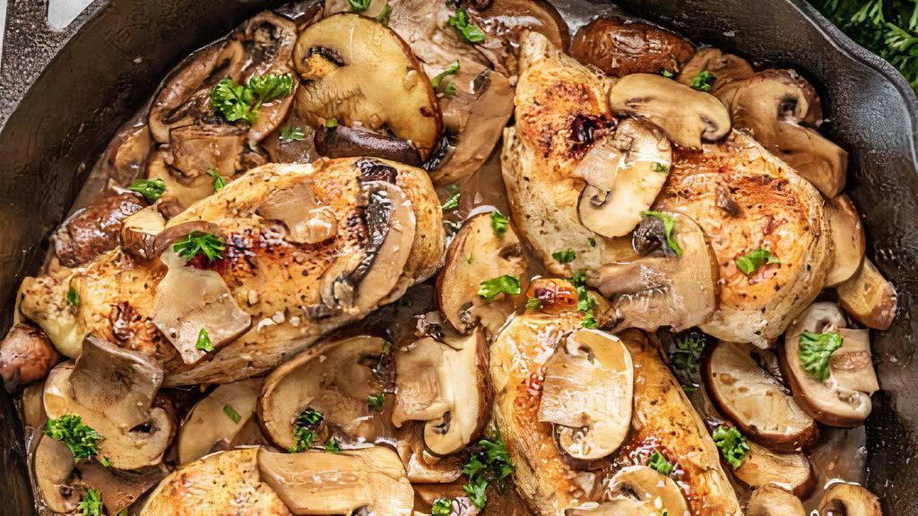 Chicken Marsala · Pan fried chicken breast topped with demi-glaze and mushroom. Served with white cheddar mashed potatoes and vegetables du jour.