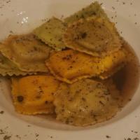 Combo Ravioli · Portabella mushroom, butternut squash, asparagus, and artichoke ravioli served with brown bu...