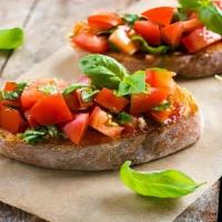 Bruschetta · Toasted bread topped with French tomatoes, basil, red onions, garlic, and fresh Mozzarella. ...