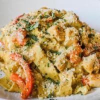 Chicken Pesto Pasta · sauteed chicken breast, pappardelle pasta, basil tomato mornay, parmesan, bell peppers, roas...
