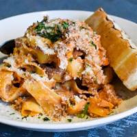 Short Rib Bolognese · Pulled short rib, pappardelle pasta, tomato mornay, carrots, onion, celery, tomato puree, ga...