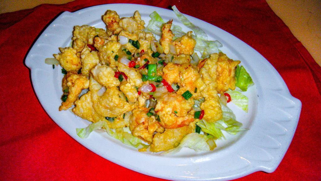 Salt & Pepper Shrimp & Calamari · A combination of shrimp and calamari, lightly battered and infused with chili peppers and our special salt and pepper seasoning.